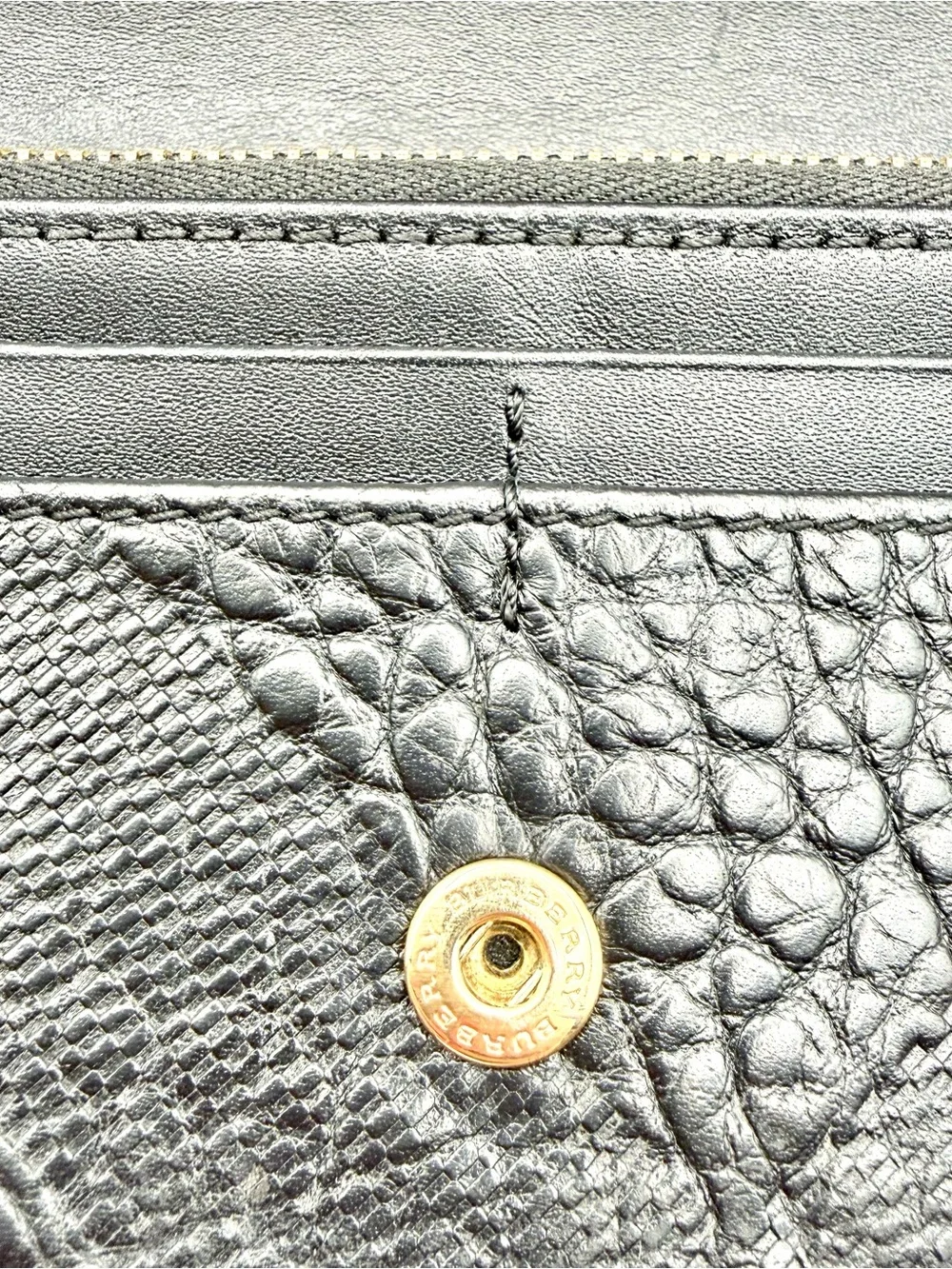 Burberry embossed pattern
