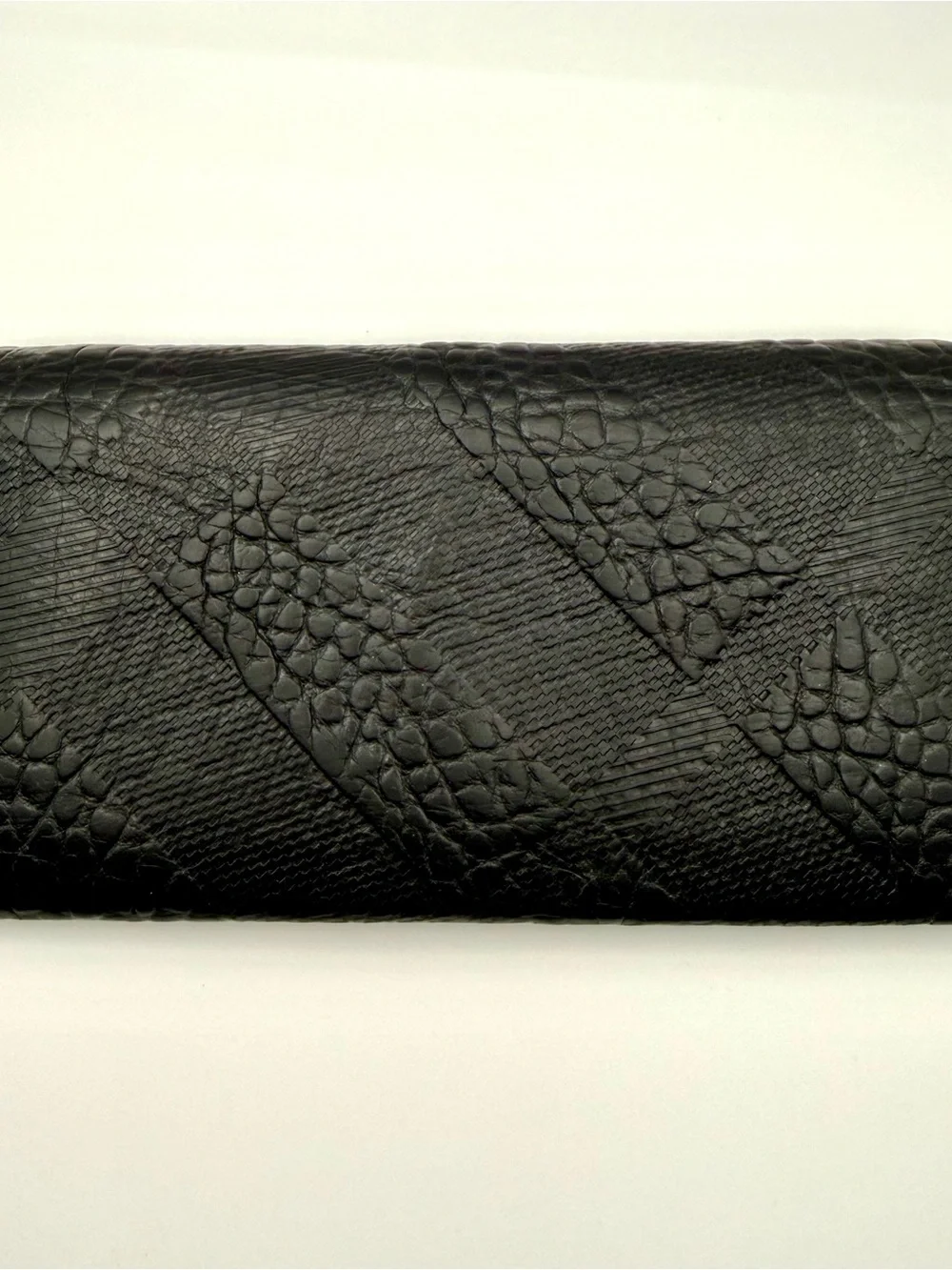 Burberry embossed pattern