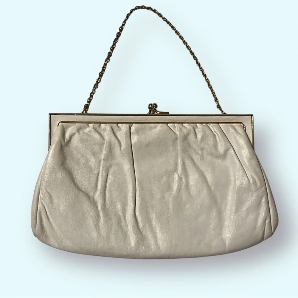 Etra White leather evening clutch.