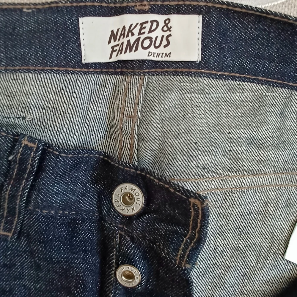 Naked & Famous Denim being raw fading