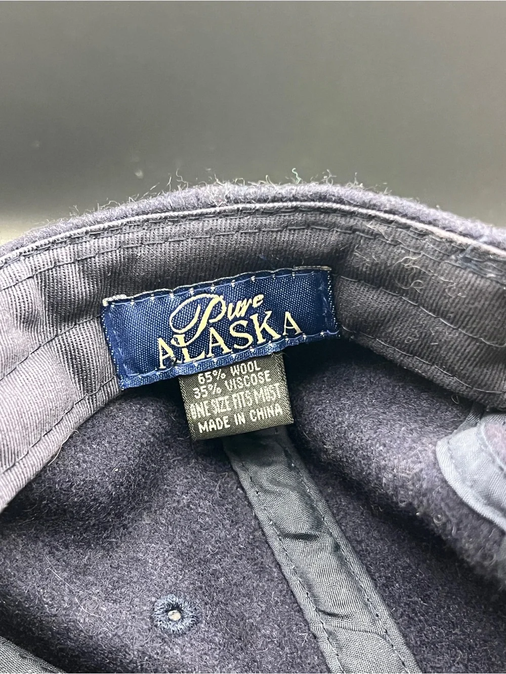 Alaska Embroidered Wolf Cap Hat in Navy and Tan