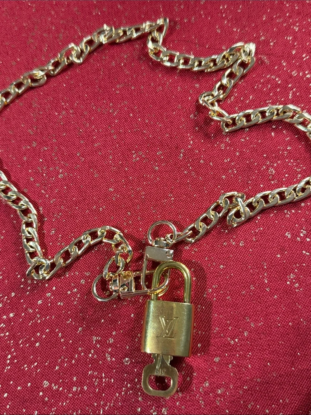 Louis Vuitton gold tone