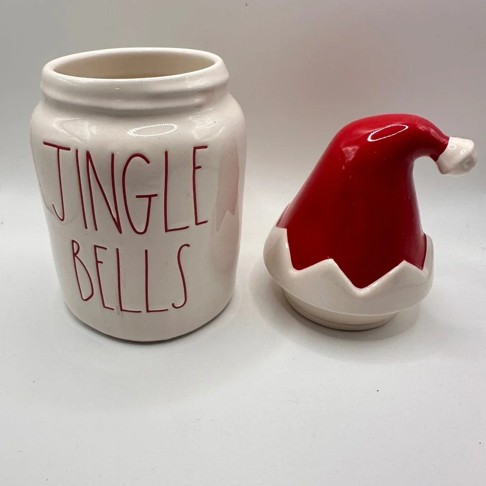 Rae Dunn Jingle Bells Christmas Canister with Santa Hat Lid Magenta Ceramic Jar