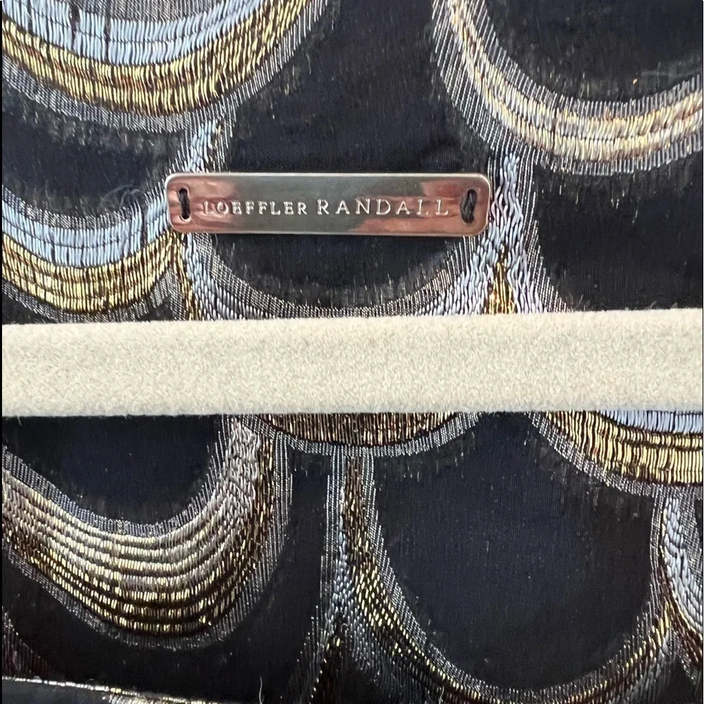 Loeffler Randall loeffler randall