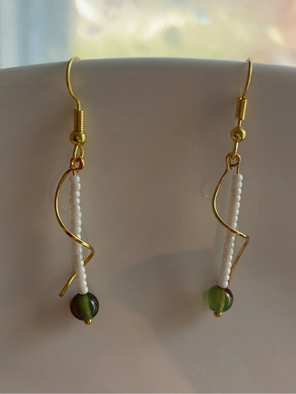 Dainty Drop Gold-toned Wavy Metal Design Adorned | White & Olive Grean Jade Bead