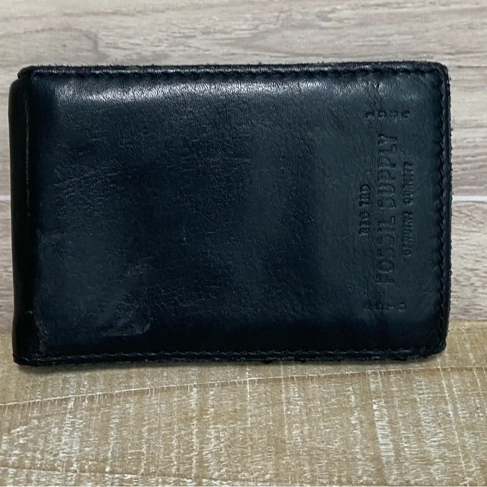 Fossil Men's Black Leather Bifold Wallet with Embossed Logo