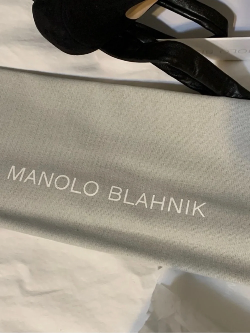 Manolo Blahnik longer ties elegant