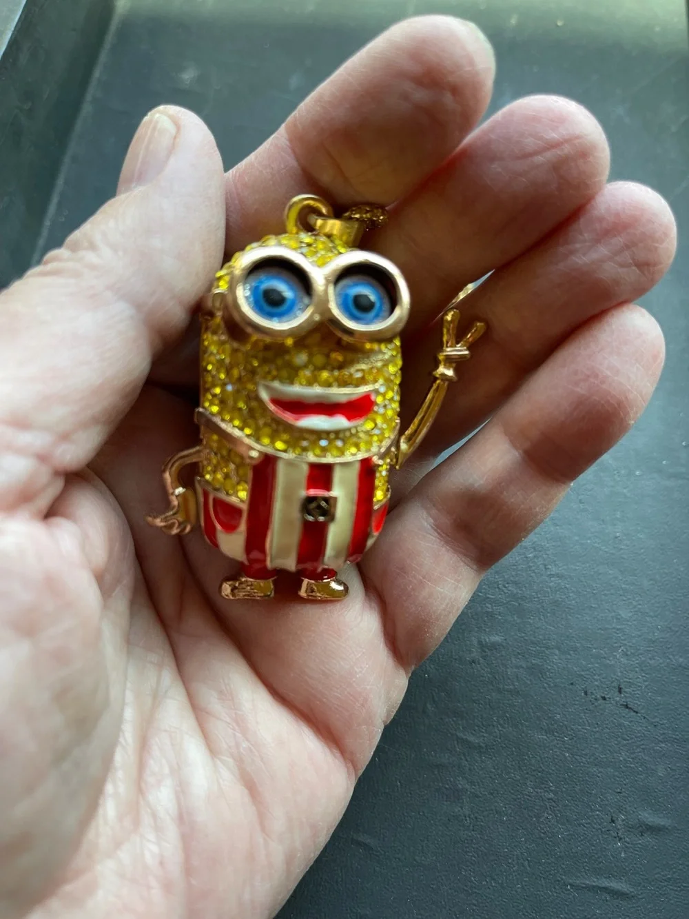 Minion Crystal Yellow Pendant with Red Stripe Overalls. His  Arms Move. NWOT