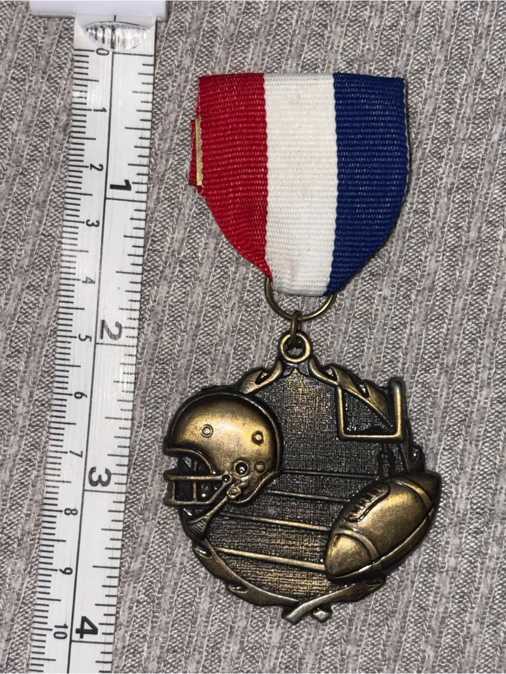 PDU marked bronze tone round football & helmet medal brooch w multicolor ribbon