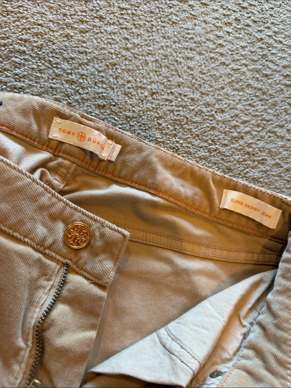 Tory Burch tan super skinny pants with gold logo hardware