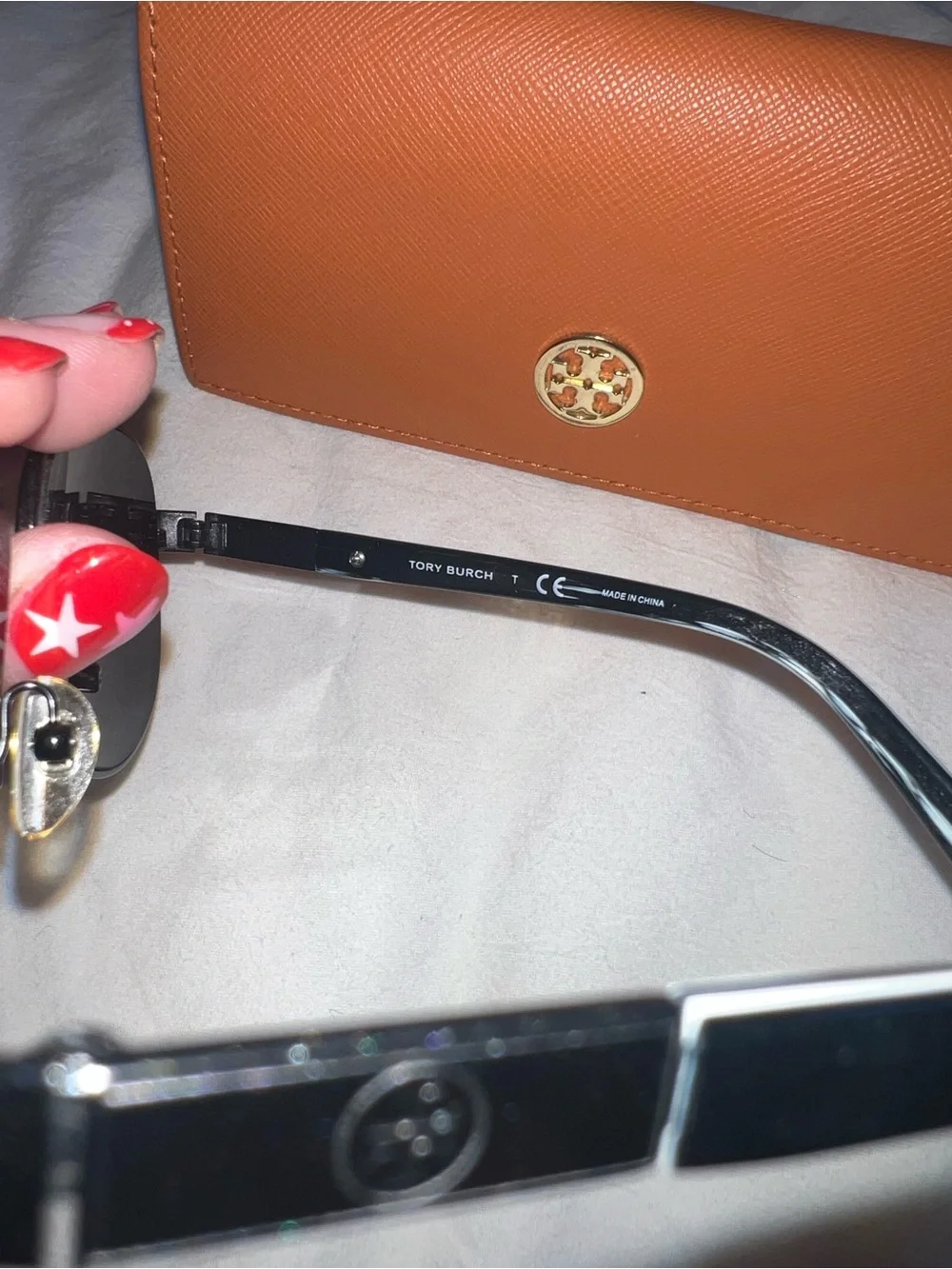 Tory Burch Orange Saffiano Wallet-Style Sunglass Case with Black Aviator Shades