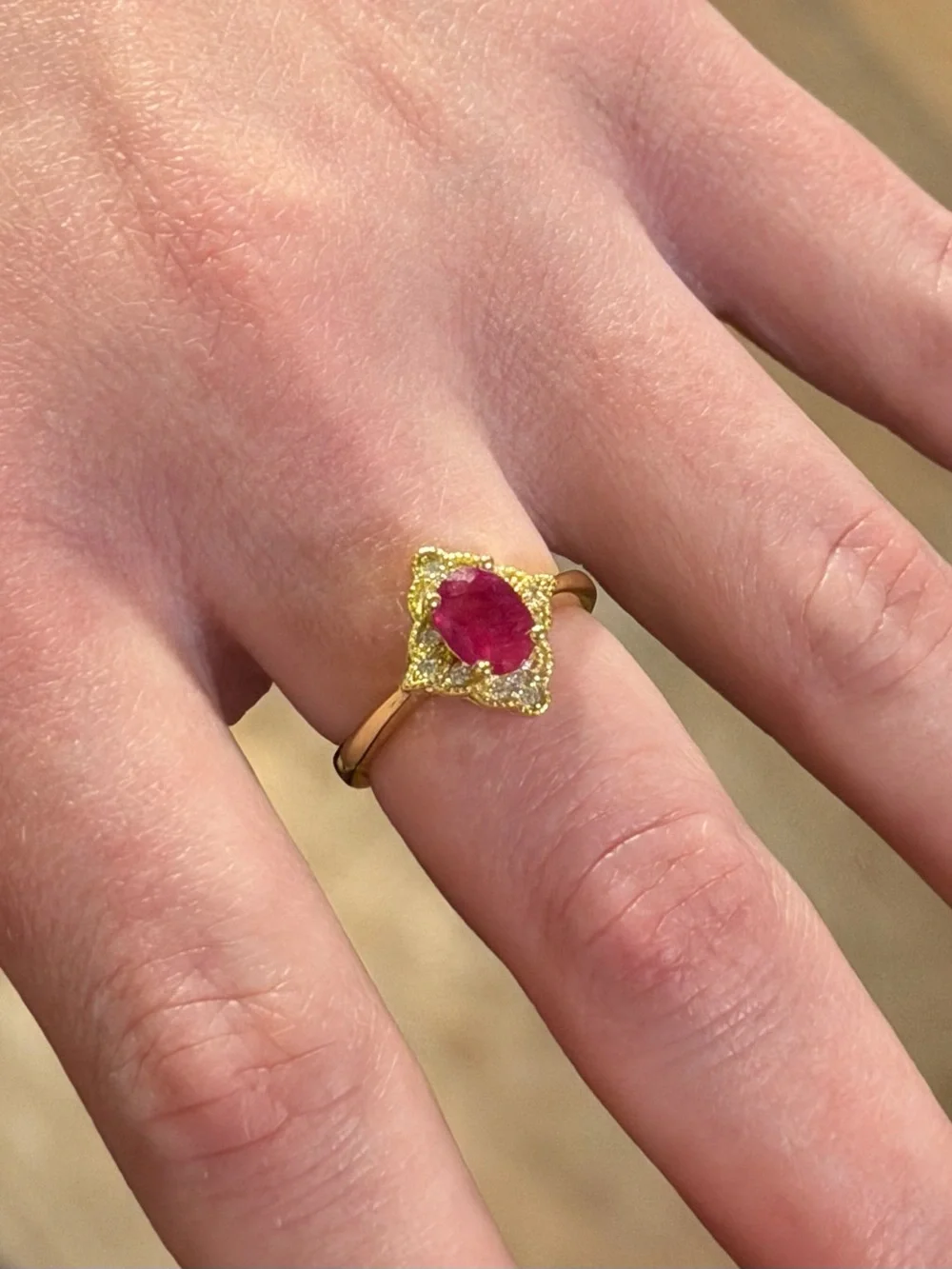 Stunning Natural 7x5mm Oval Ruby Zircon  accent in 14K Yellow GP Ring Size 6