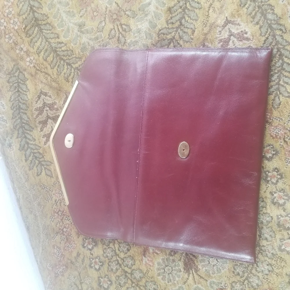 Etienne Aigner leather thr brand