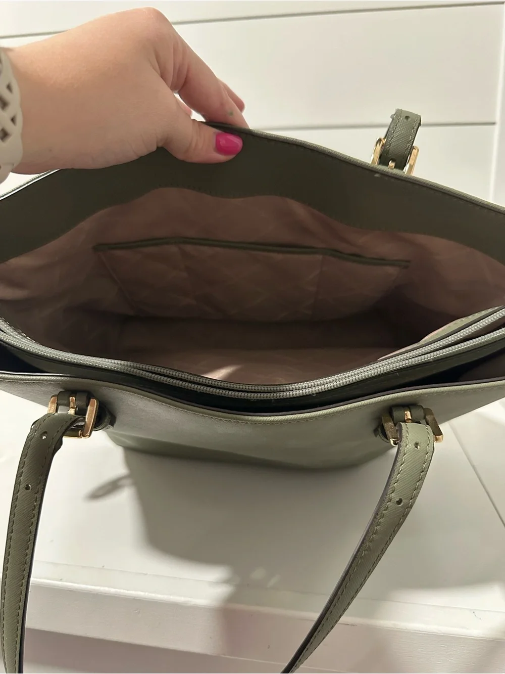 Michael Kors olive includes