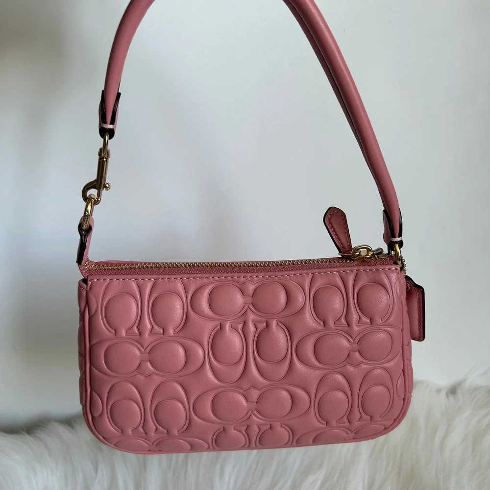 Coach bag number wear