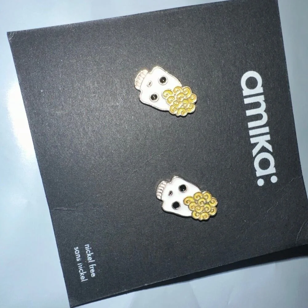amika earrings brand
