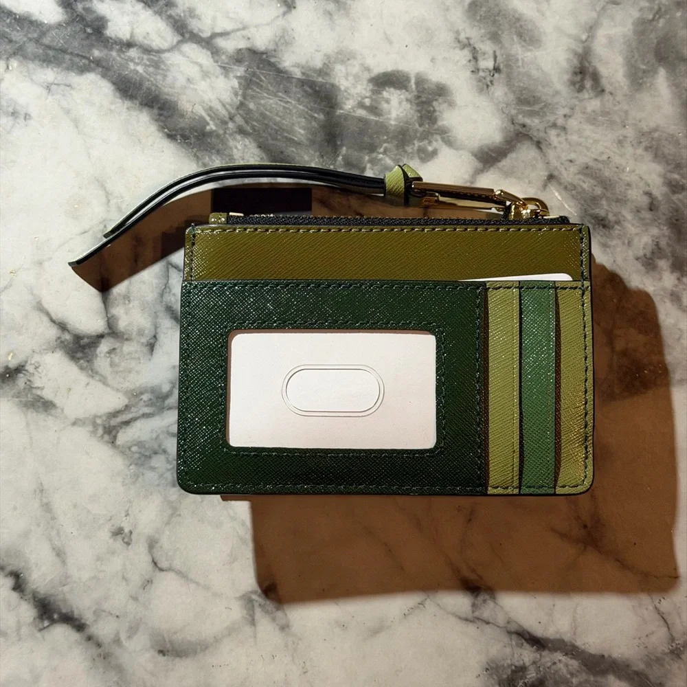 Marc Jacobs compact luxurious
