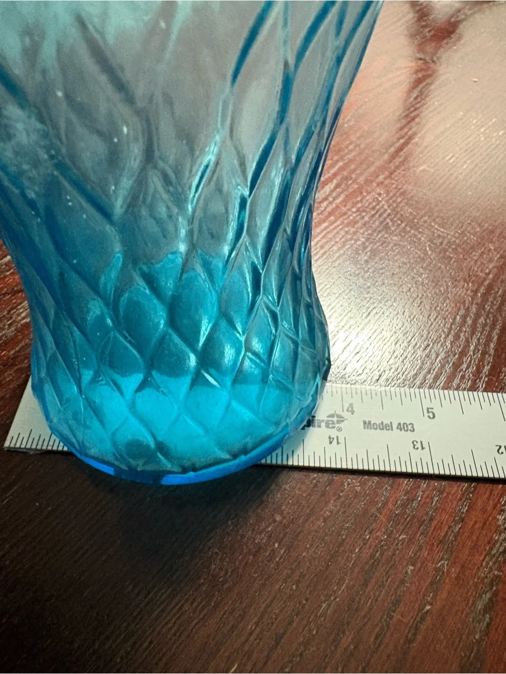 Vintage Blue Glass Decanter 100% recycled glass with a textured diamond pattern.