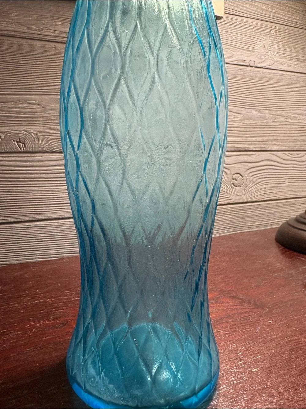 Vintage Blue Glass Decanter 100% recycled glass with a textured diamond pattern.