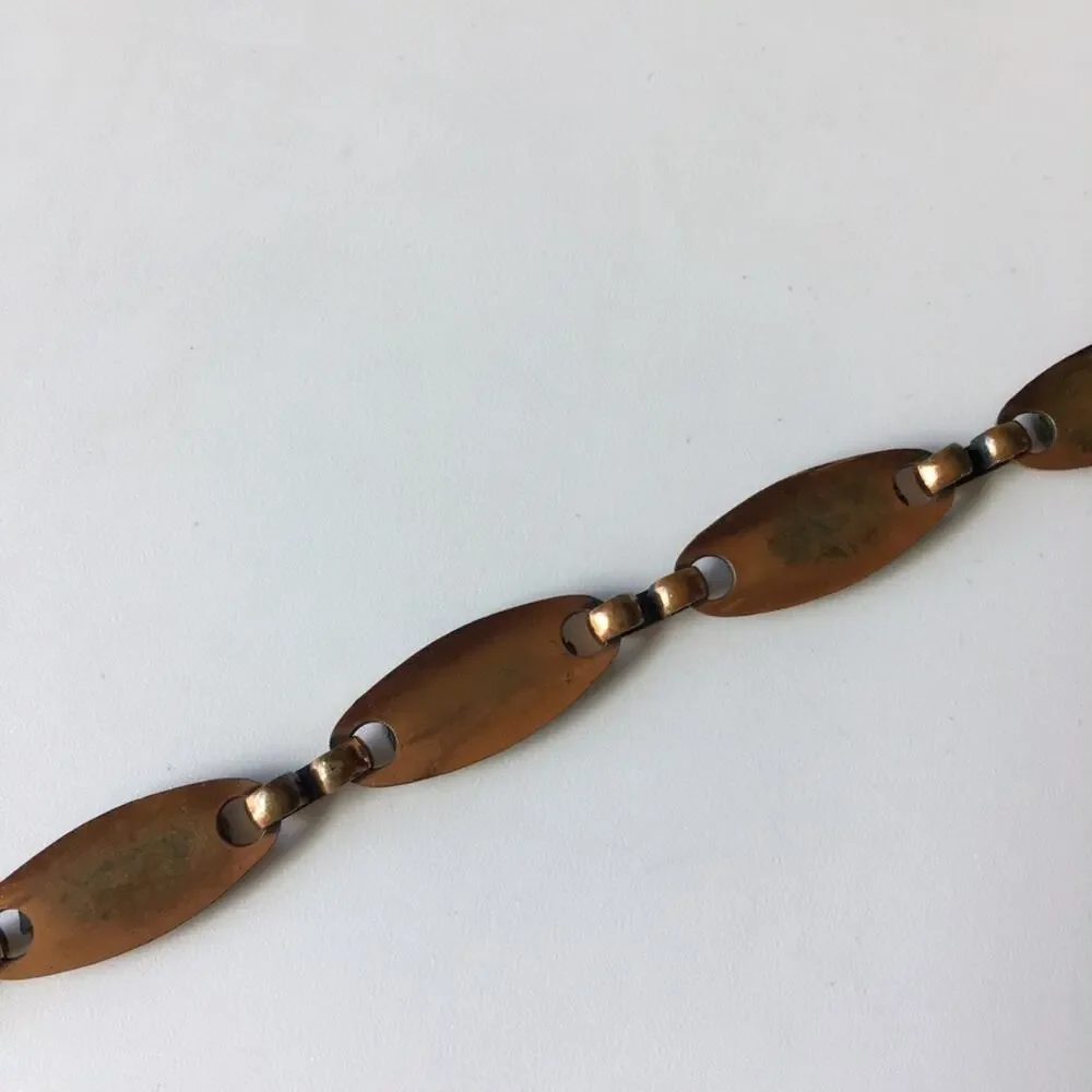 Copper tone abstract design link bracelet