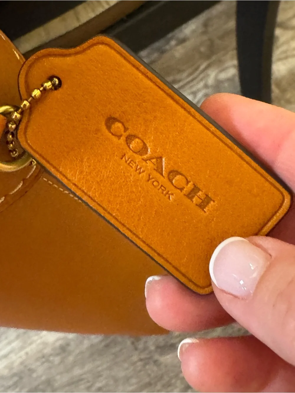 Coach shoulder logo