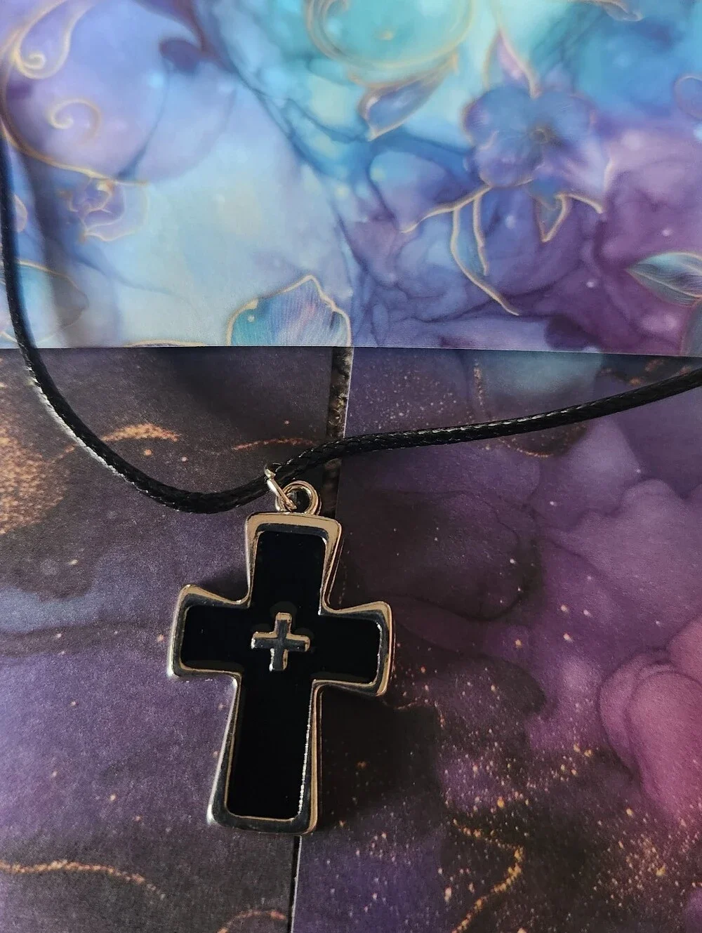 N/A black cross