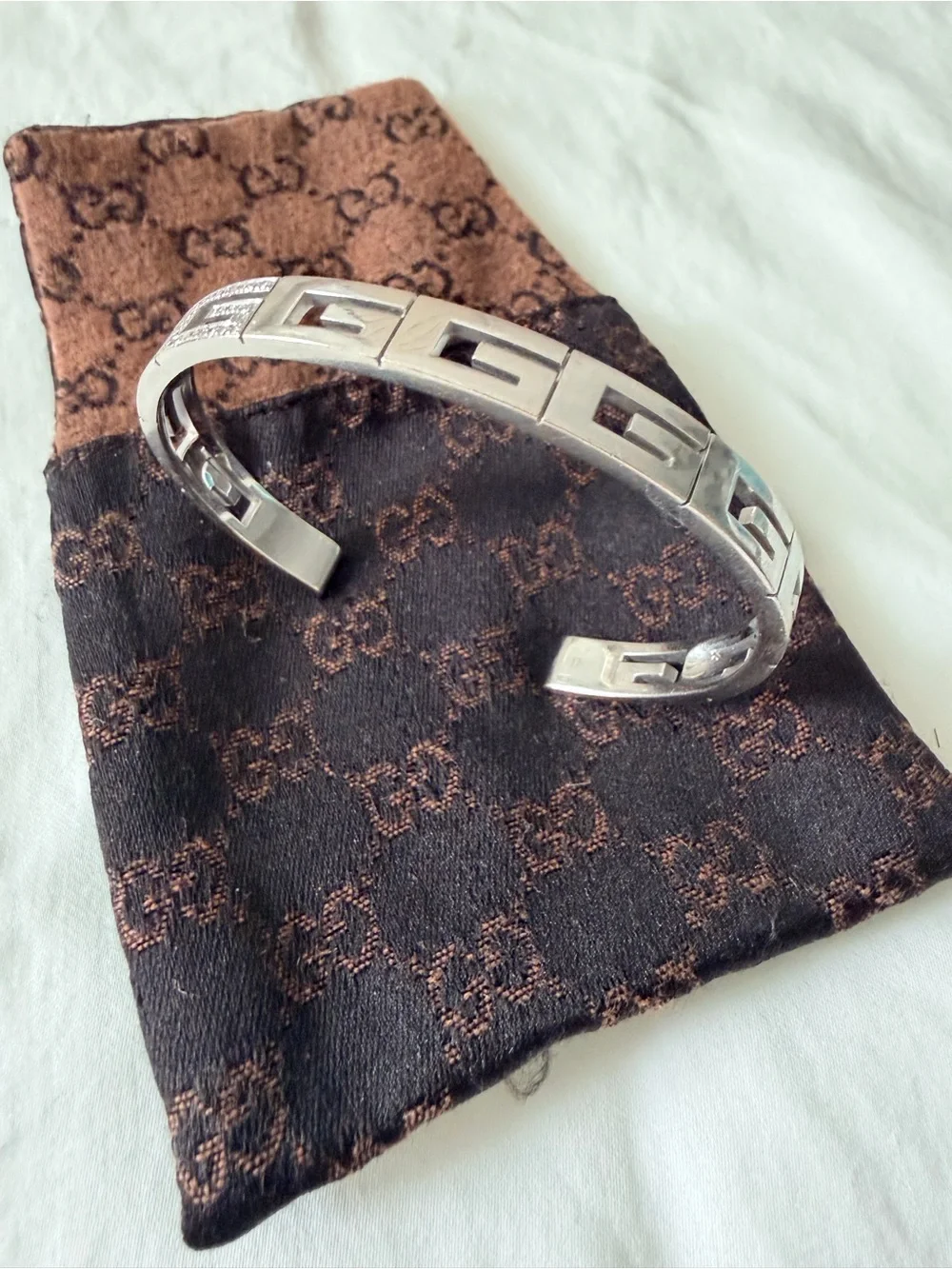 GUCCI White Gold/Diamond “G” logo bracelet