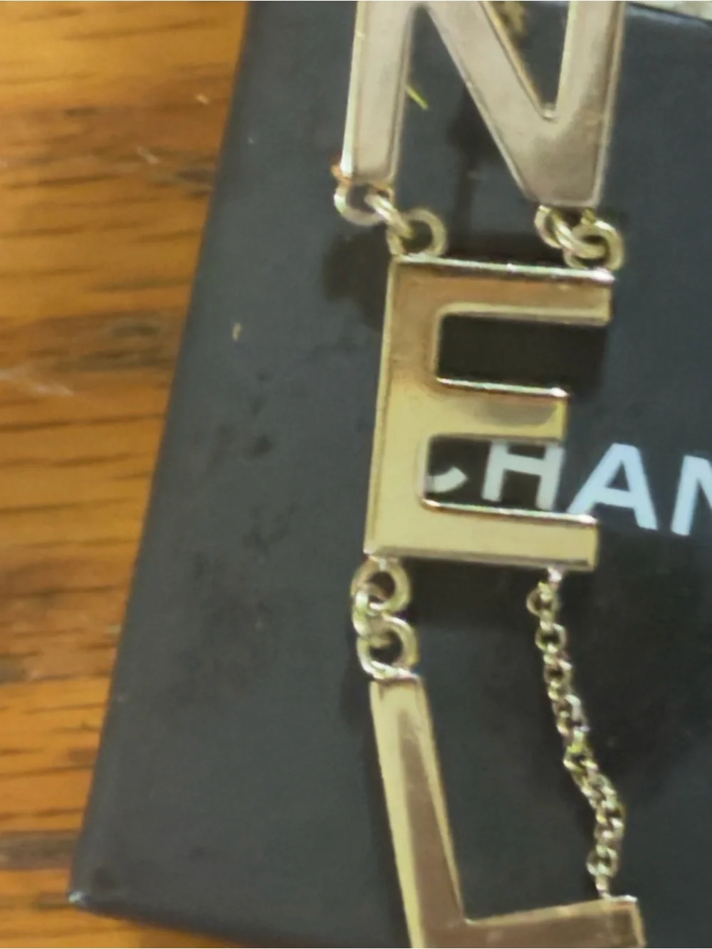 CHANEL logo earring