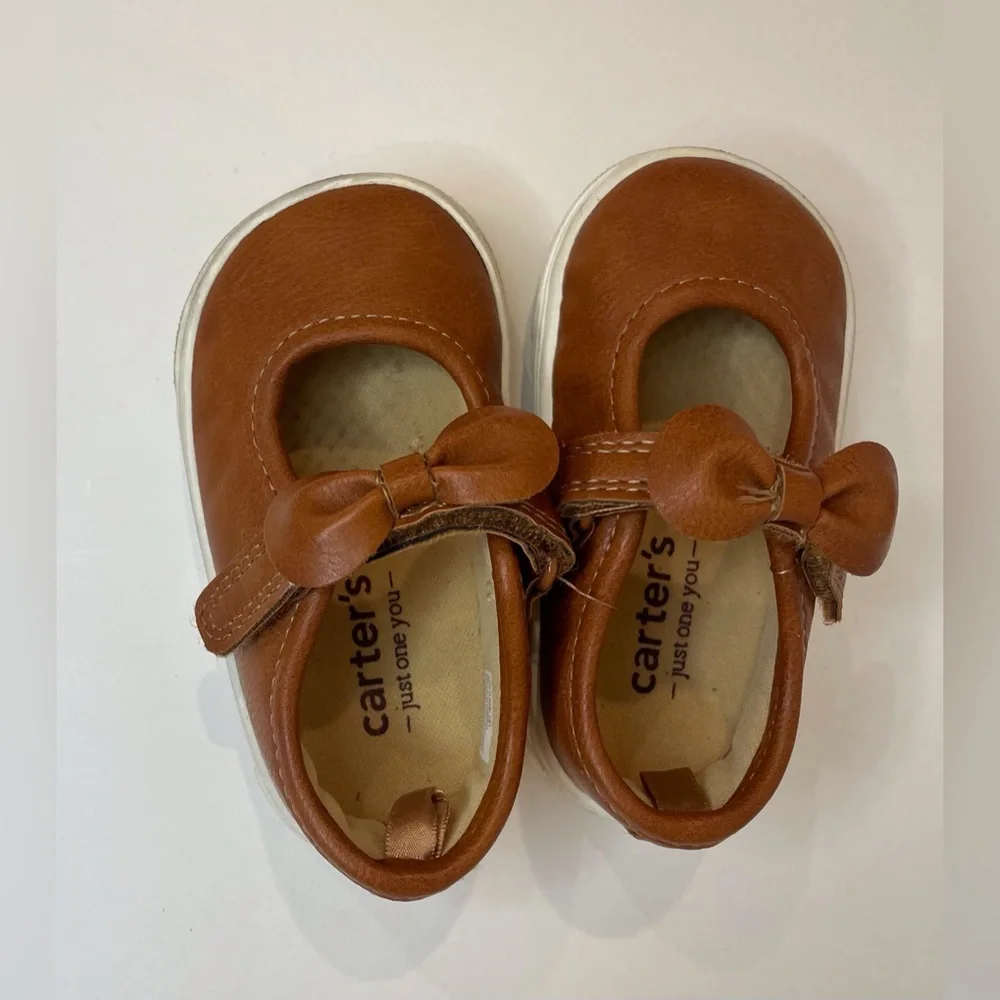 Carters featuring comfortable bow