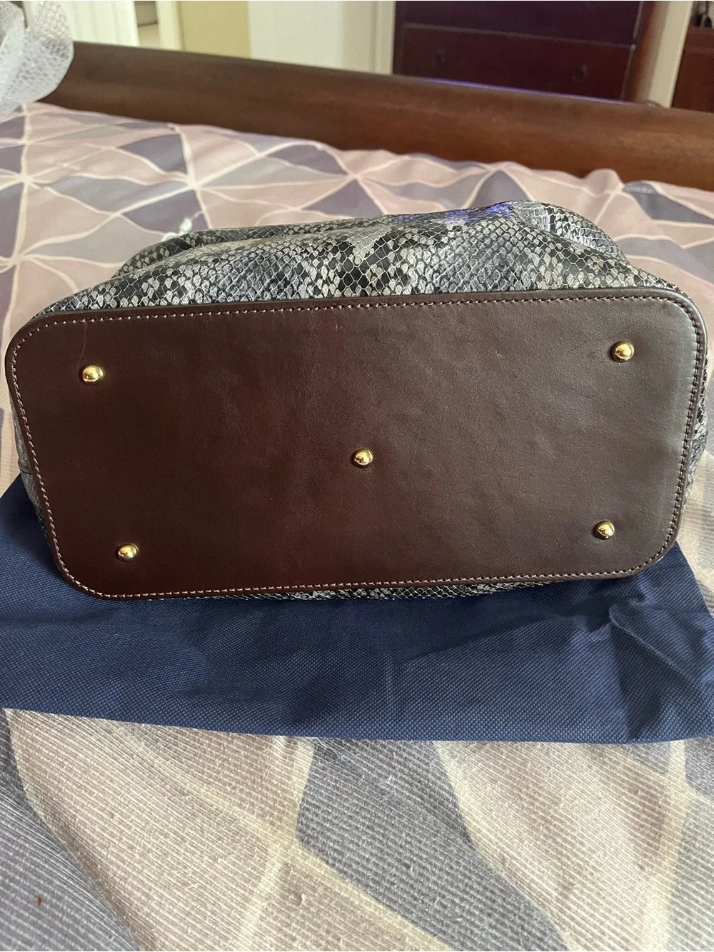 Dooney & Bourke leather stains tones