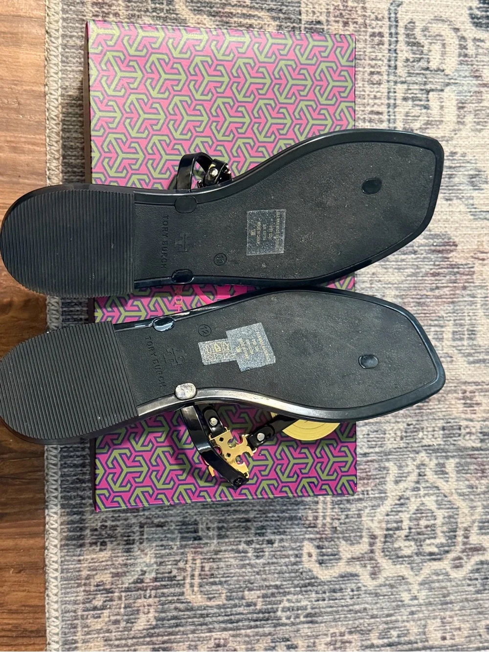 Tory Burch Black Patent Flat Sandals with Gold Logo Accent