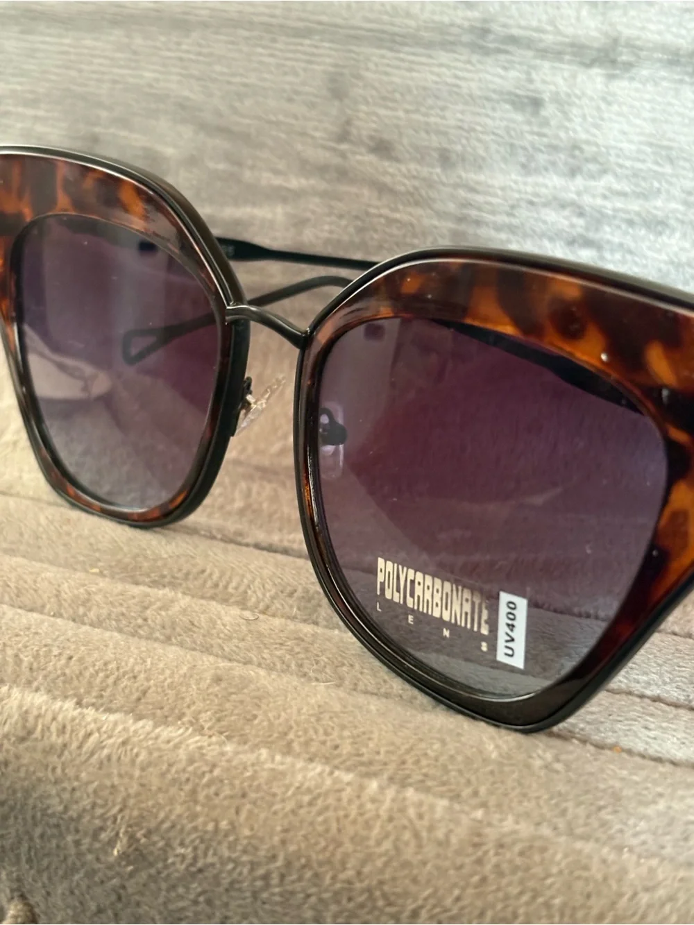 Tortoiseshell Cat Eye Sunglasses with Purple Lenses