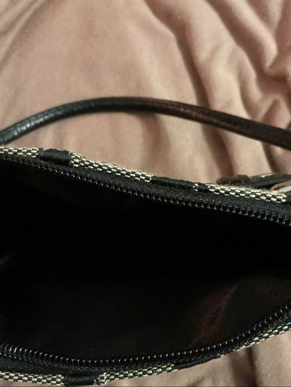 Coach secures strap