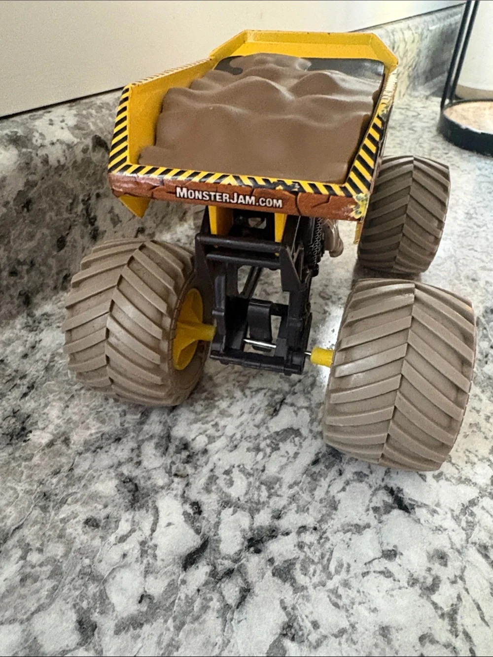 Monster Jam toy yellow earth