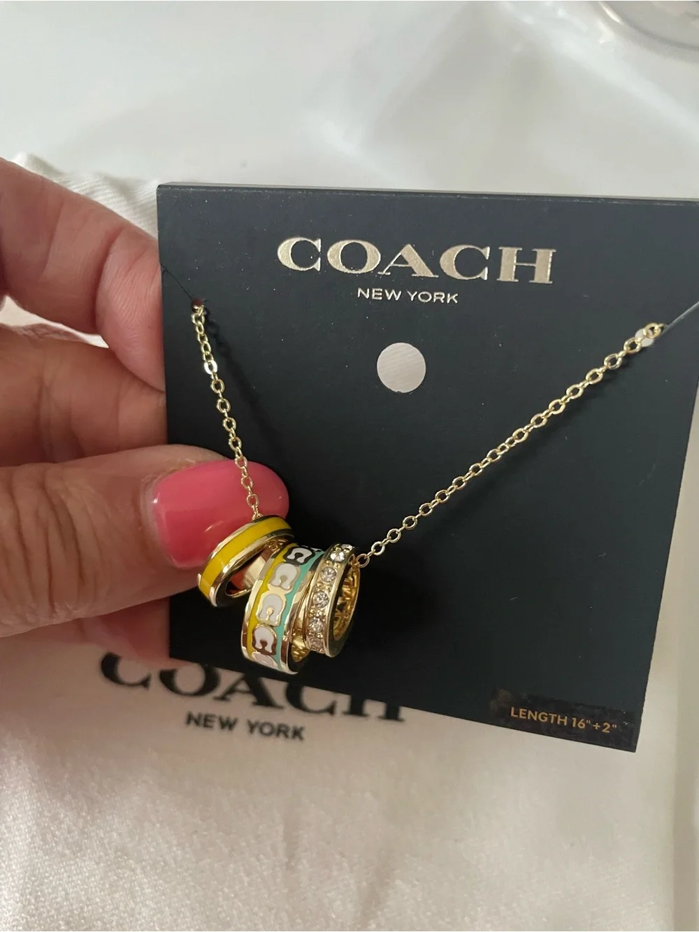 Coach necklace stacked