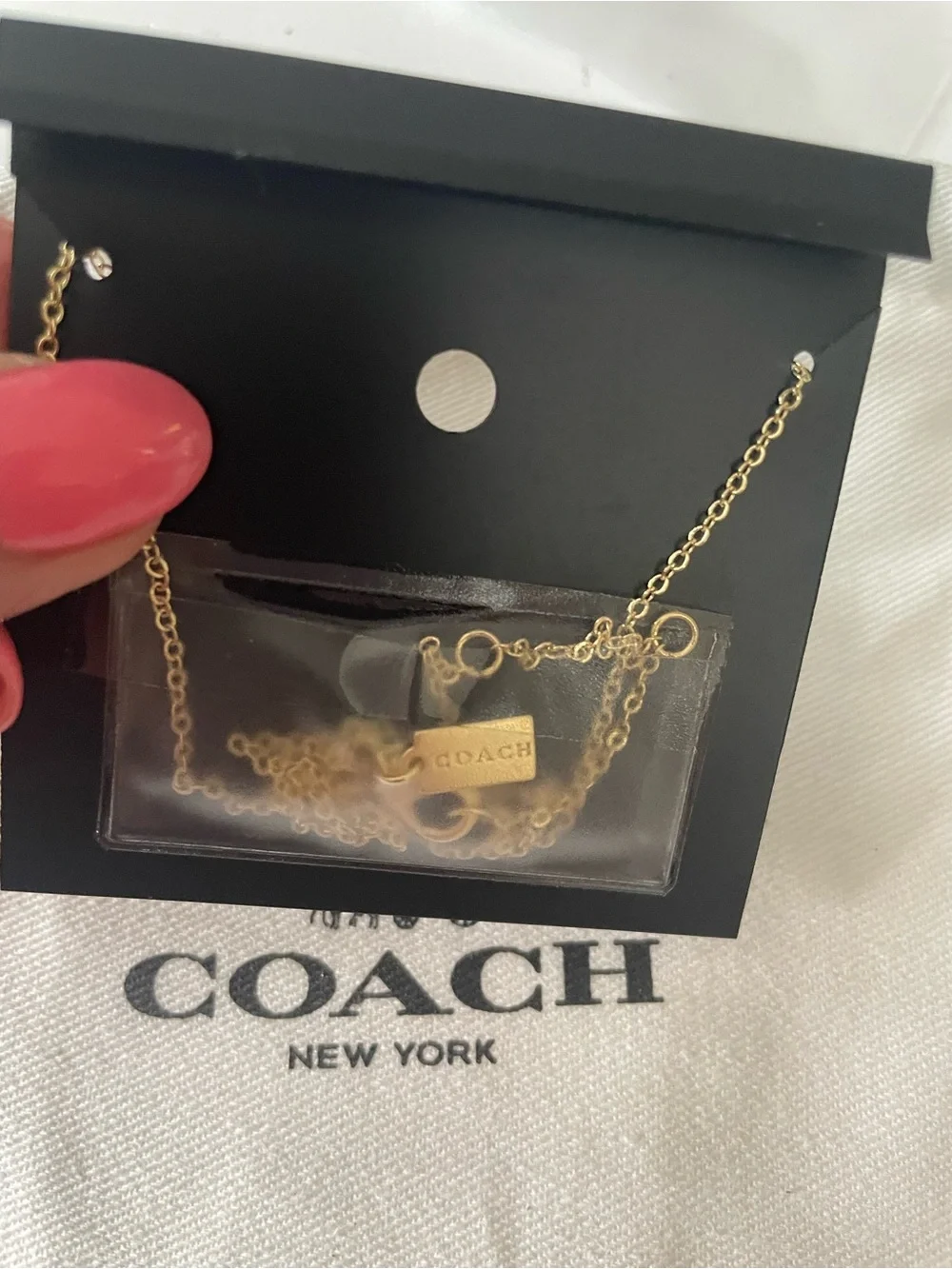Coach necklace stacked