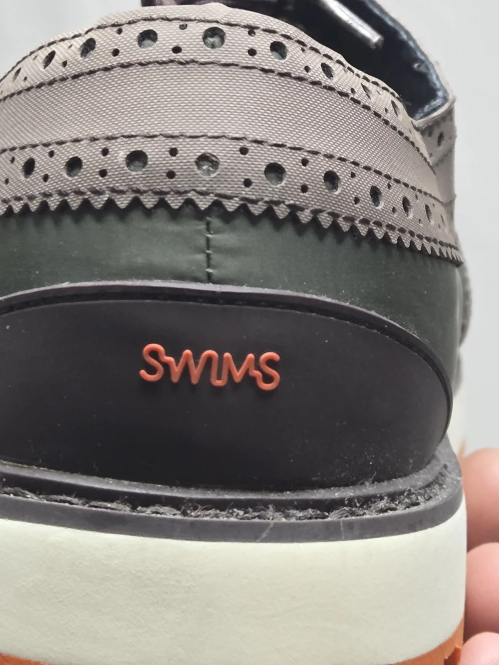 Swims modern wingtip