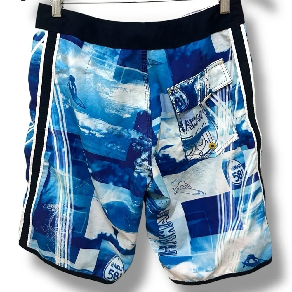 250 Hawaiian 581 | EUC Brazil Men’s Vintage Blue Surf Print Board Shorts (Sz 29)