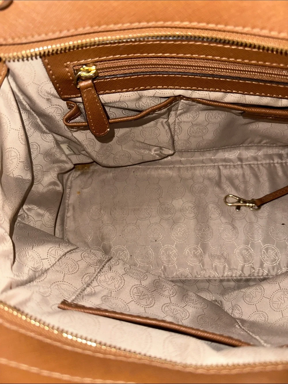 Michael Kors questions leave