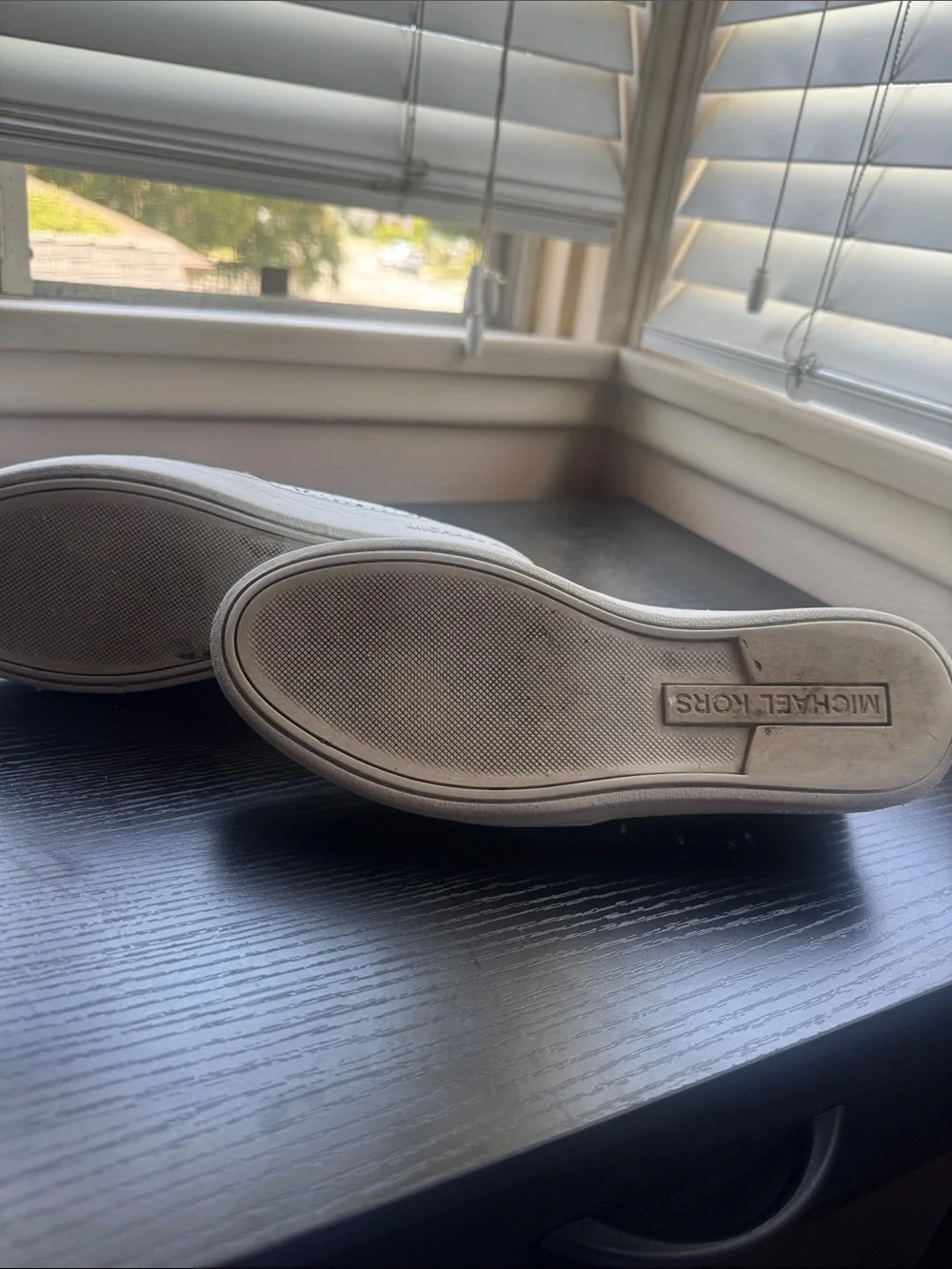 Michael Kors White Perforated Slip-On Sneakers with Floral Cutouts