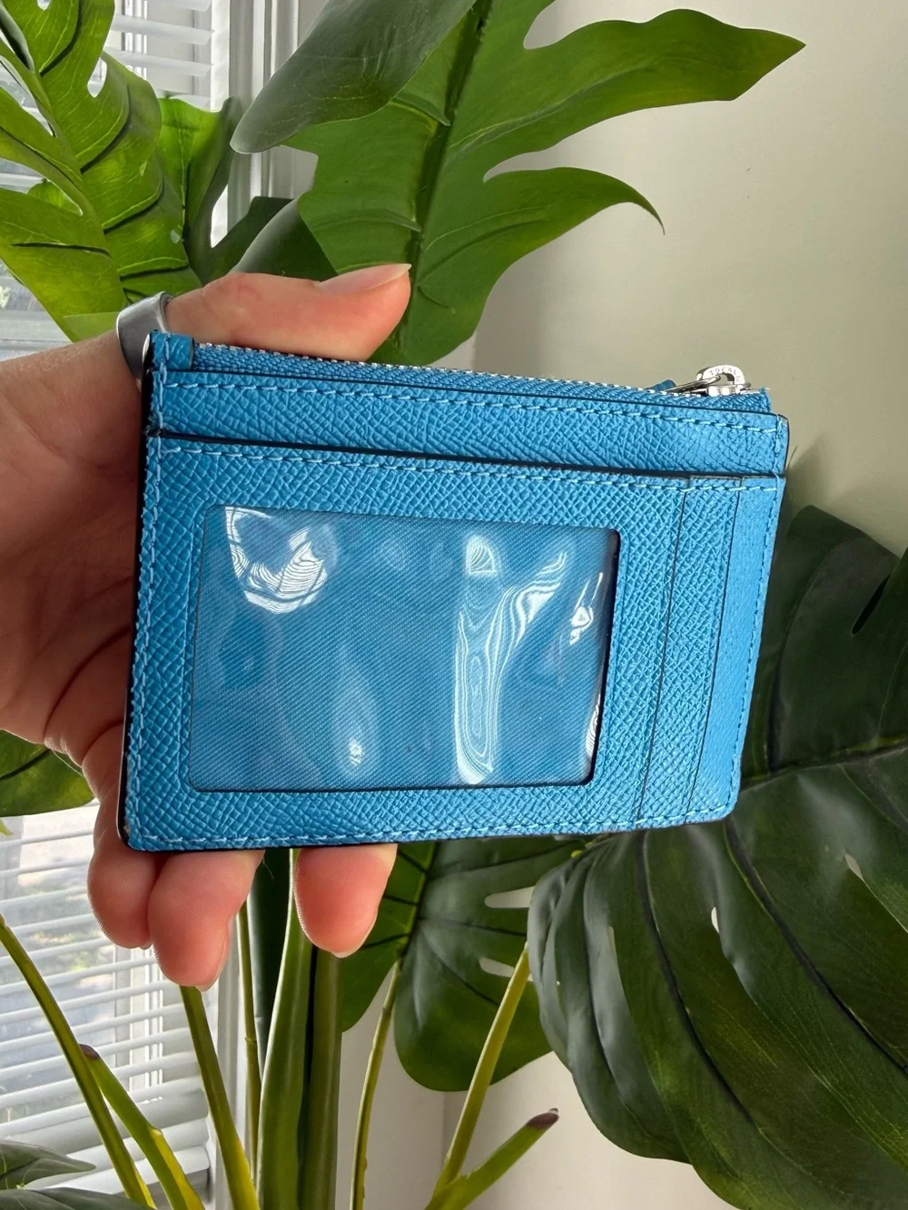 Coach sleek zip