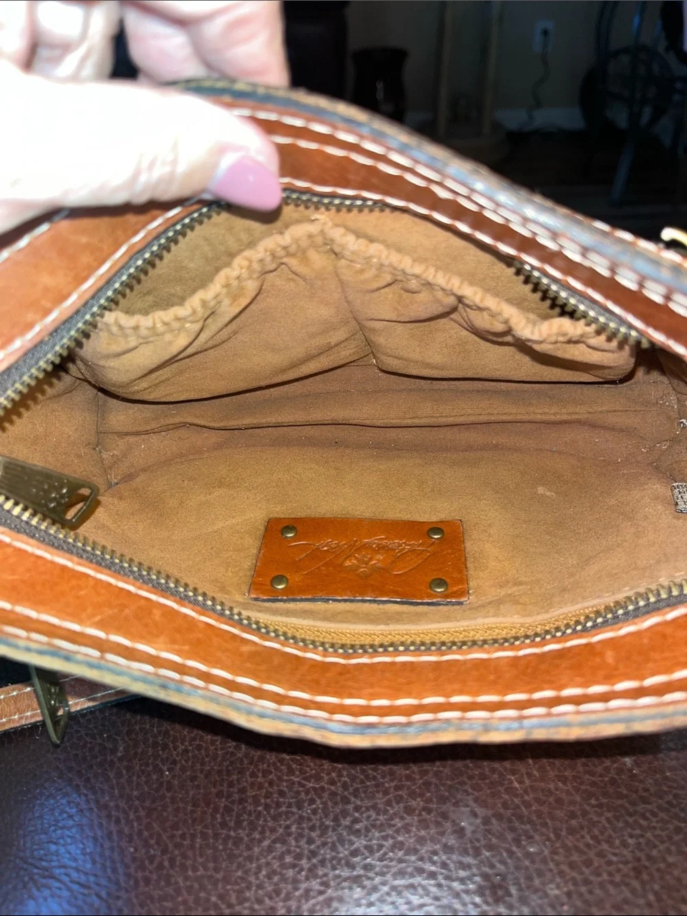 Tan Leather Crossbody Bag with Decorative Embossing