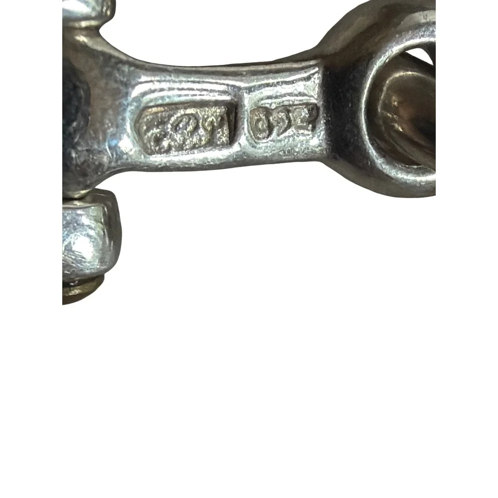 Unbranded sterling silver