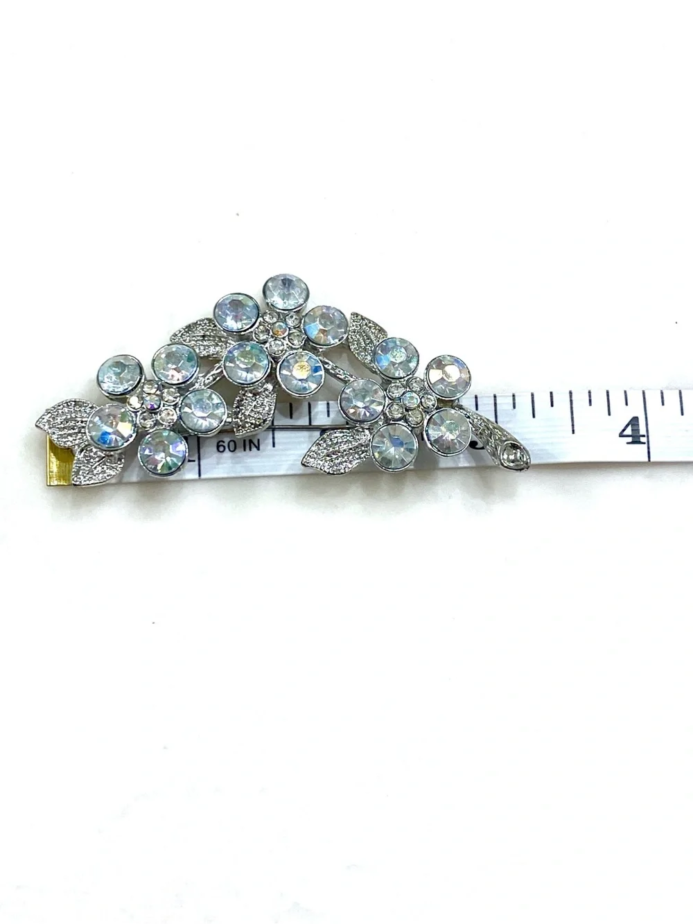 Jaclyn Smith flower iridescent silver