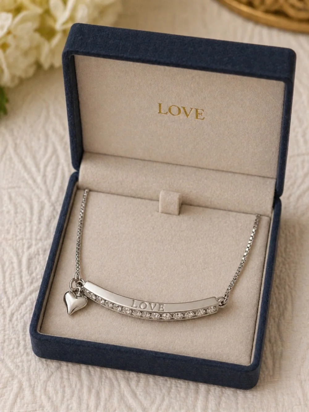 Silver Tone Rhinestone Adjustable Bracelet with Heart Charm Inscribed with Love