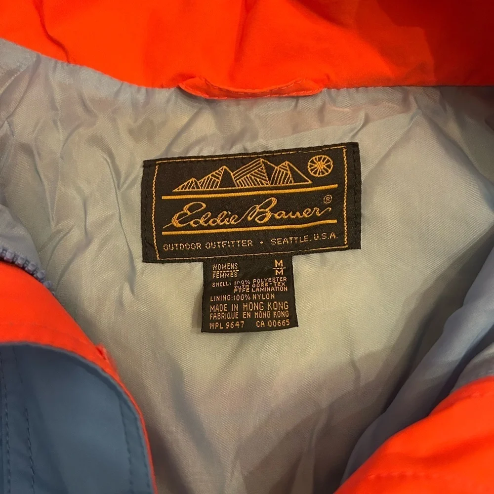 Eddie Bauer Blue Raincoat with Orange Accents