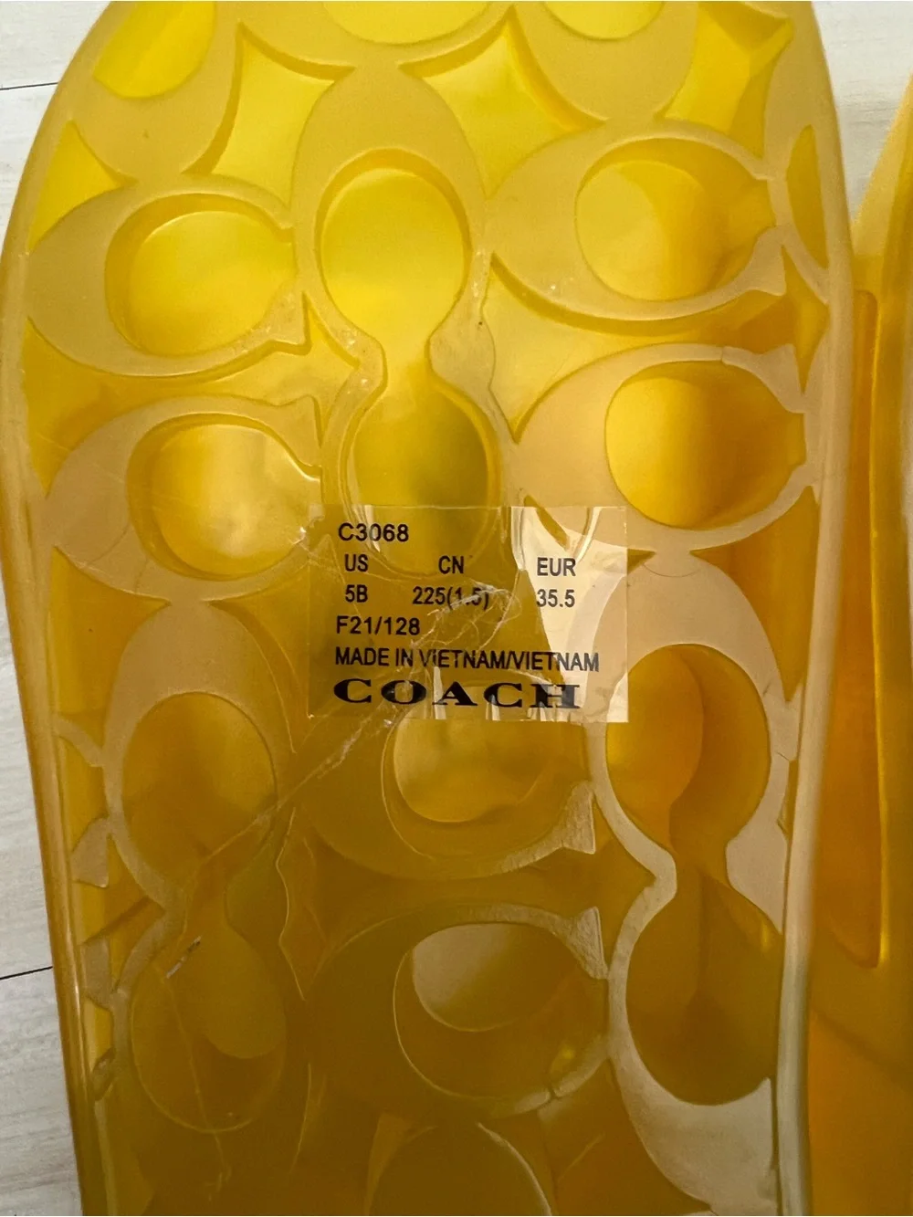 Coach translucent yellow