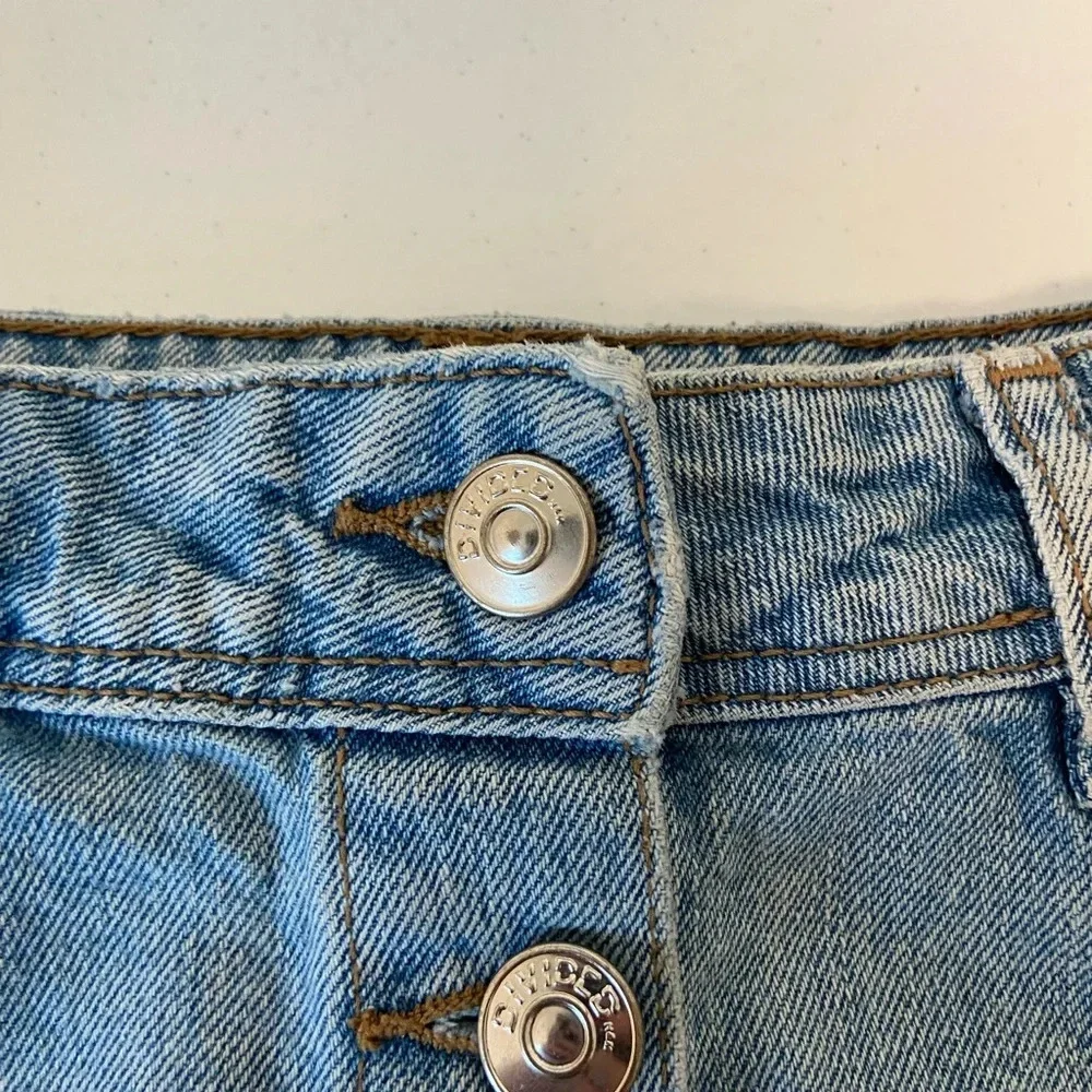Divided images miniskirt shown