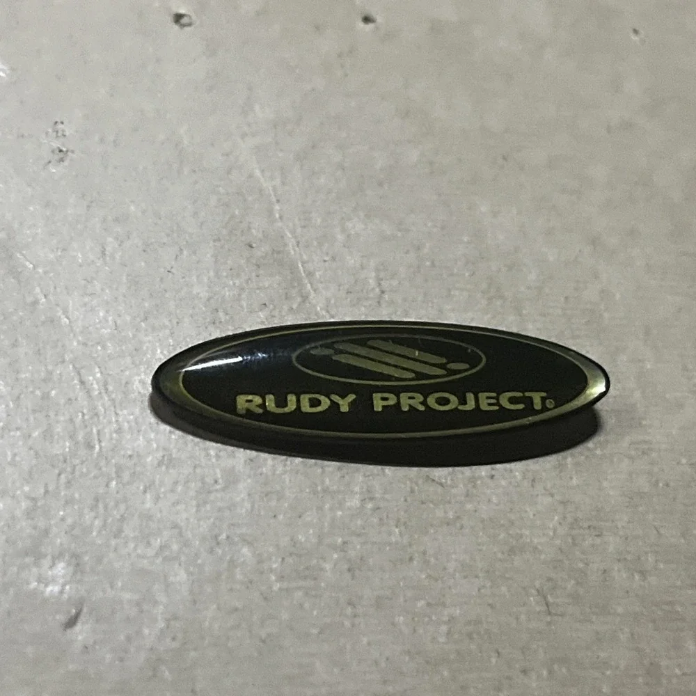 Rudy Project Sunglass Company‎ Lapel Hat Pin