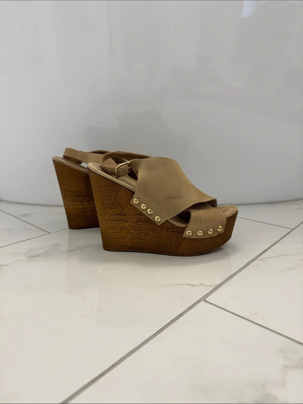 Sandro Rossi chic tan
